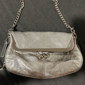 Coach silver met olive bag with kiss lock. Functional&chic.